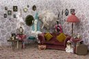 A bright colourful room with eclectic props